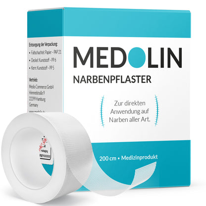 Verpackung und Pflasterrolle nebeneinander 